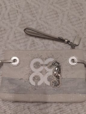 Coach Beige Cream Wristlet with Embellished Seahorse
